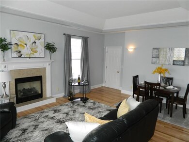 Newer hardwood flooring in spacious Living/Dining 