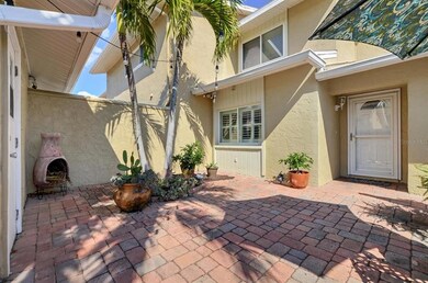 ONE CAR GARAGE ENTRY TO COURTYARD
