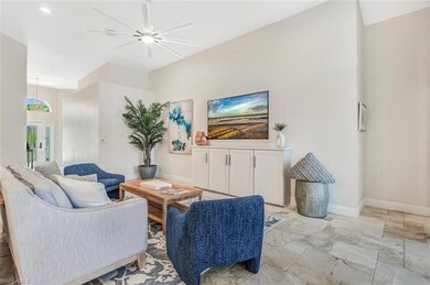 Tiled living room with ceiling fan