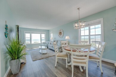Dining area with hardwood / wood-style flooring an