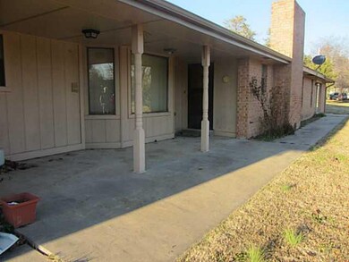 Exterior Back. Covered area at back of house