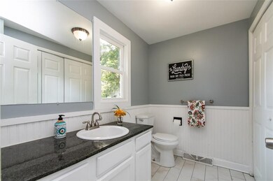 Half bath on the first floor - granite counter and
