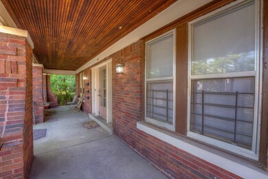 View of patio with a porch