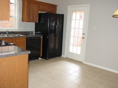 Kitchen with new tile floor