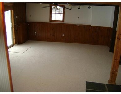 Exterior Front. Lower Level Rec Room...