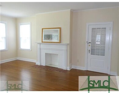 Living Room. Original Wood Burning Fireplace.  Gla