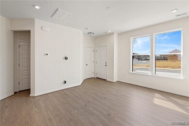 Spare room with light hardwood / wood-style floors