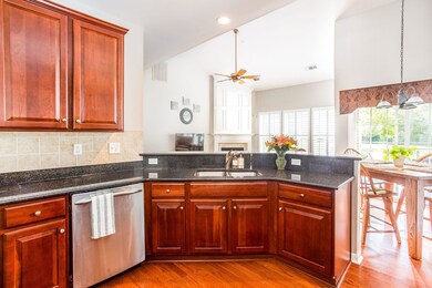Large kitchen with granite countertops, stainless steel appliances, upgraded cabinet drawers and an open concept layout