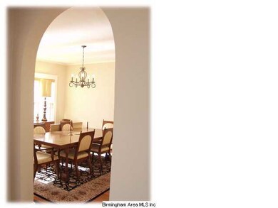 Arch from the living room in the dining room