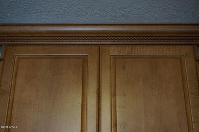 beautiful molding on cabinets.jpg