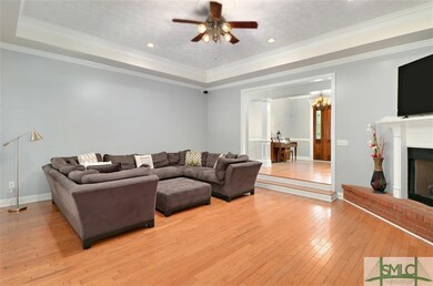 FOYER LEADS YOU TO THE GREAT ROOM WITH WOOD FLOORS