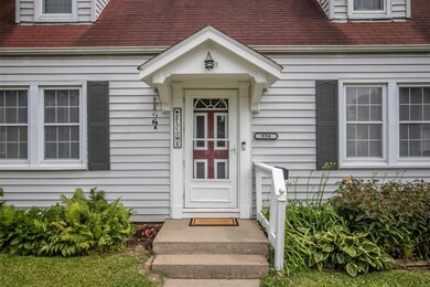 Storm door & covered entry keeps you out of the ra