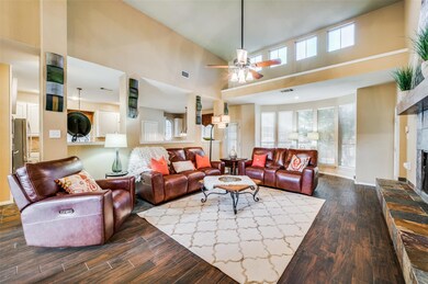2 story family room opens to the kitchen with lots
