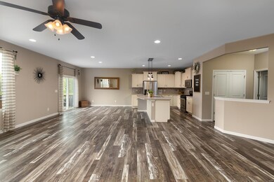 Great room flows into the dining/kitchen area that is PERFECT for entertaining!