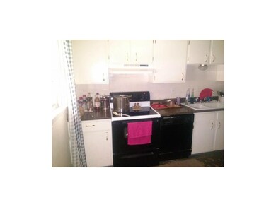 Kitchen, newer countertops, needs flooring, applia