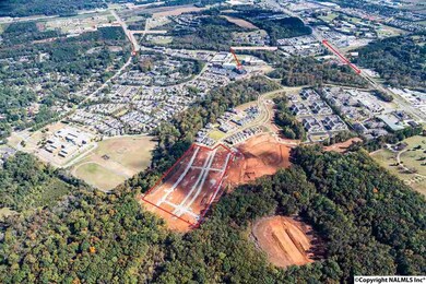 Hwy 72, the iconic VOP Fountain, the Providence round-about, & Creekside phases beyond the bridge in the Village of Providence!