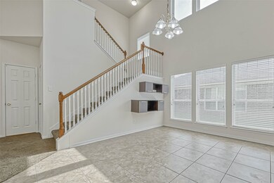 This is the dining room with some decorative hanging shelves.