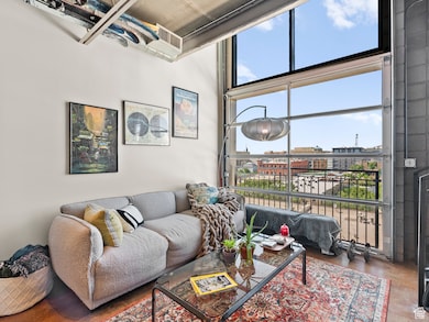 Living area featuring a towering ceiling