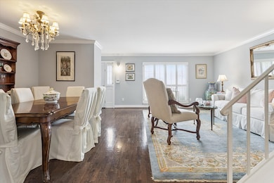 You'll love the open floor plan, the gorgeous hardwoods, pretty mouldings and freshly painted spaces throughout.