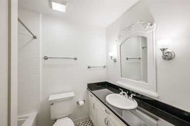 Bathroom is located off of Bedroom and has large v