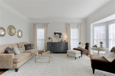 The lovely living room could easily be used as an 
