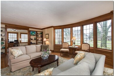 Wonderful bow windows look over the front yard and