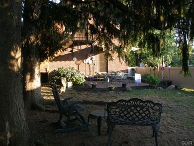 Mature trees in the private back yard
