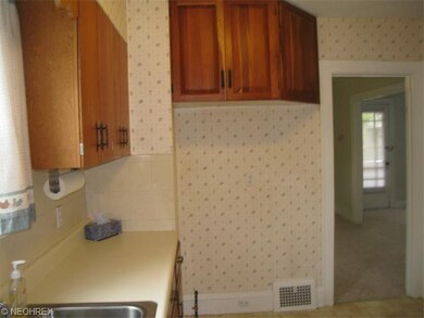 View of the kitchen into the dining room.