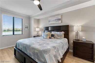 Bedroom with ceiling fan, light wood-type flooring