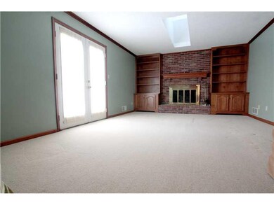 Family Room. Cozy up the fireplace & French doors 
