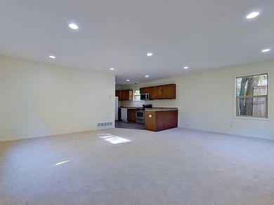Recessed lighting in the kitchen, dining and living room