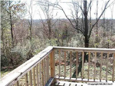 ENJOY YOUR MORNING COFFEE ON THE LARGE DECK.