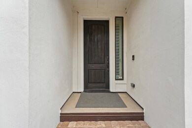 This is a welcoming front entrance featuring a stu