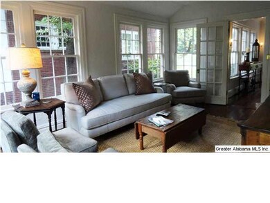 This fabulous Den is surrounded with large windows