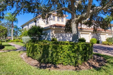 View of front facade featuring a garage, driveway,