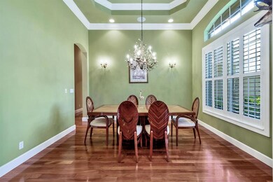 LARGE ISLAND WITH CUSTOM WOOD CABINETRY