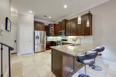 Beautiful kitchen with custom cabinets , island br