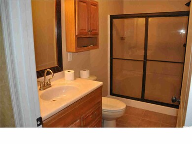 Notice the bay window in the living room (seller is having the carpet cleaned before closing)