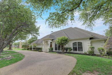 View of front of property with circle driveway