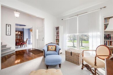 Bonus sitting room off entry.