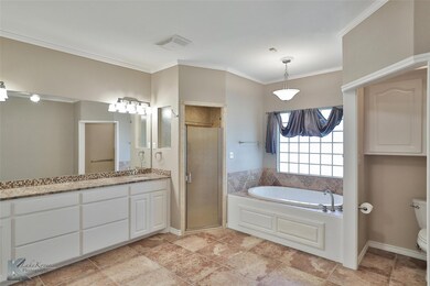 Full bathroom featuring plus walk in shower, toile