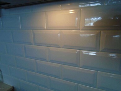 White beveled subway tile
