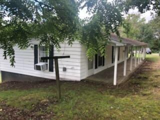 E Ridge Rd house side