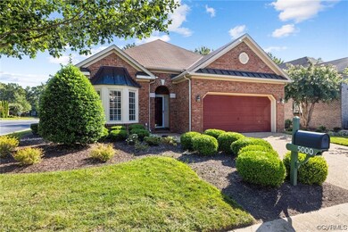 View of front of house with aggregate driveway