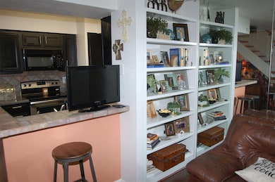 Breakfast bar & book shelves
