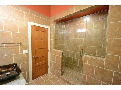 The bathroom also has a great walk-in (and around!