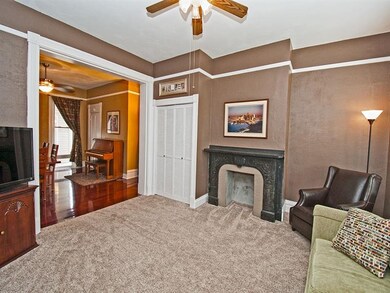 Charming living room with high ceilings, decorativ