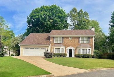 Colonial inspired home with an attached garage, a 