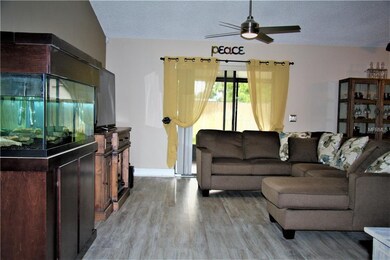 ENTRY INTO LIVING ROOM...BRAND NEW FLOORS...