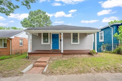 View of front of house with covered porch